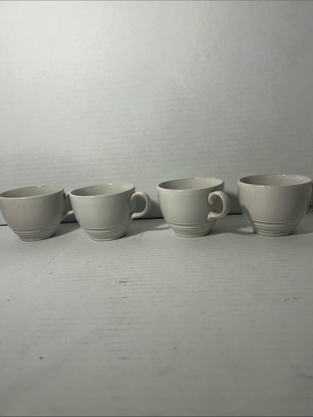 Elegant Cream Ceramic Coffee Mugs - Set of 4
Made in the USA